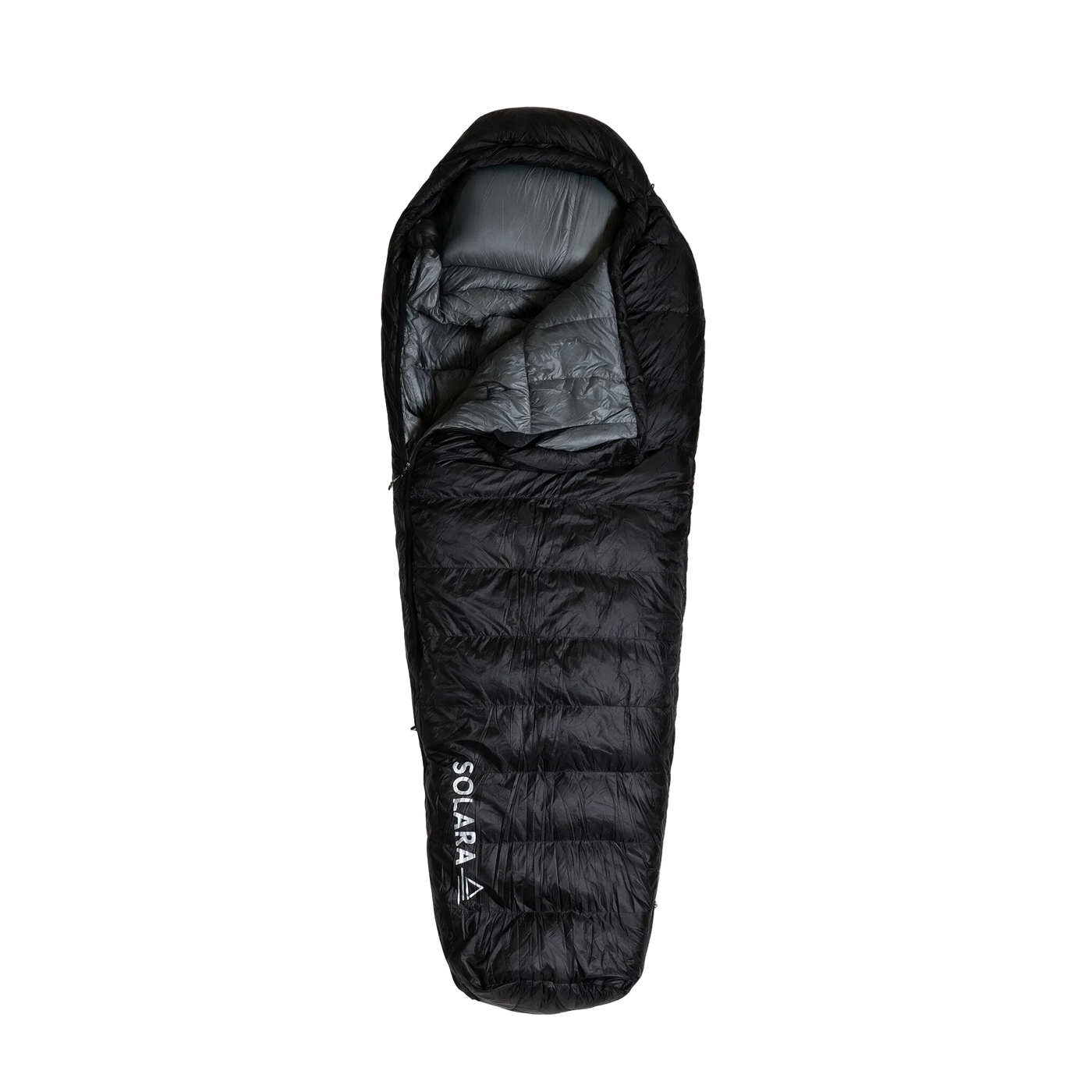 Emberline sleeping bag airing in morning sun at camp beside a motorcycle
